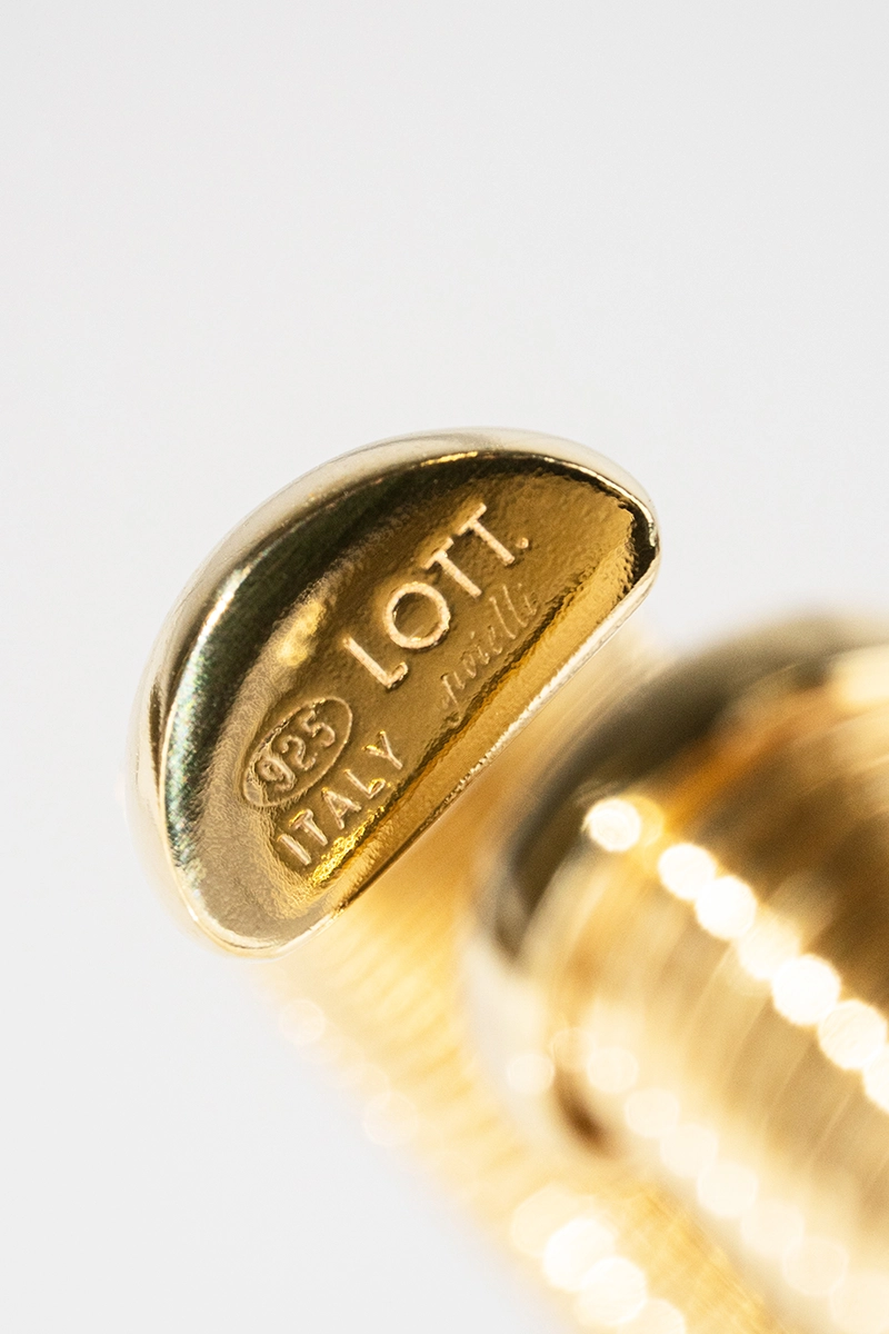 Goldfarbene Armband Bangle Striped Mile