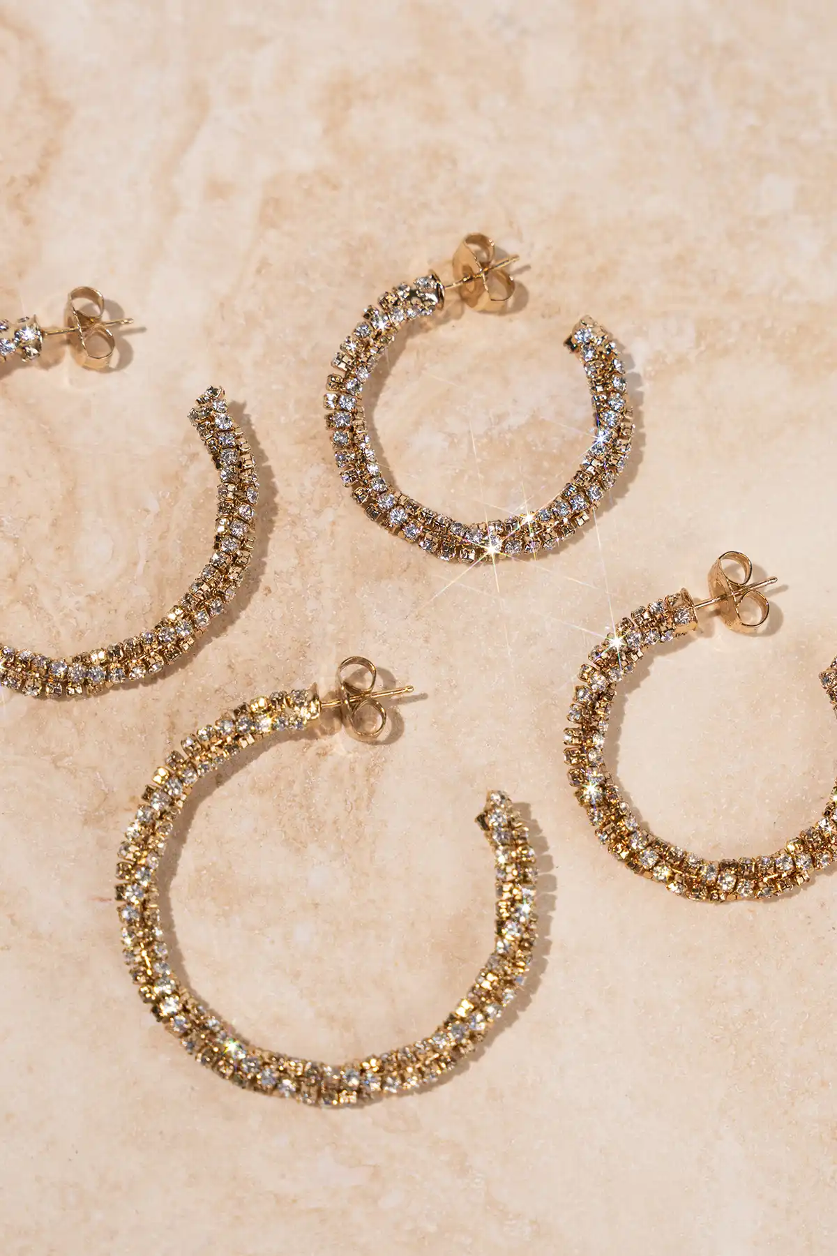 Gold/Crystal Earrings Stevie Twisted Tennis Hoop Llott-theme.productDescriptionPage.SEO.byTheBrand