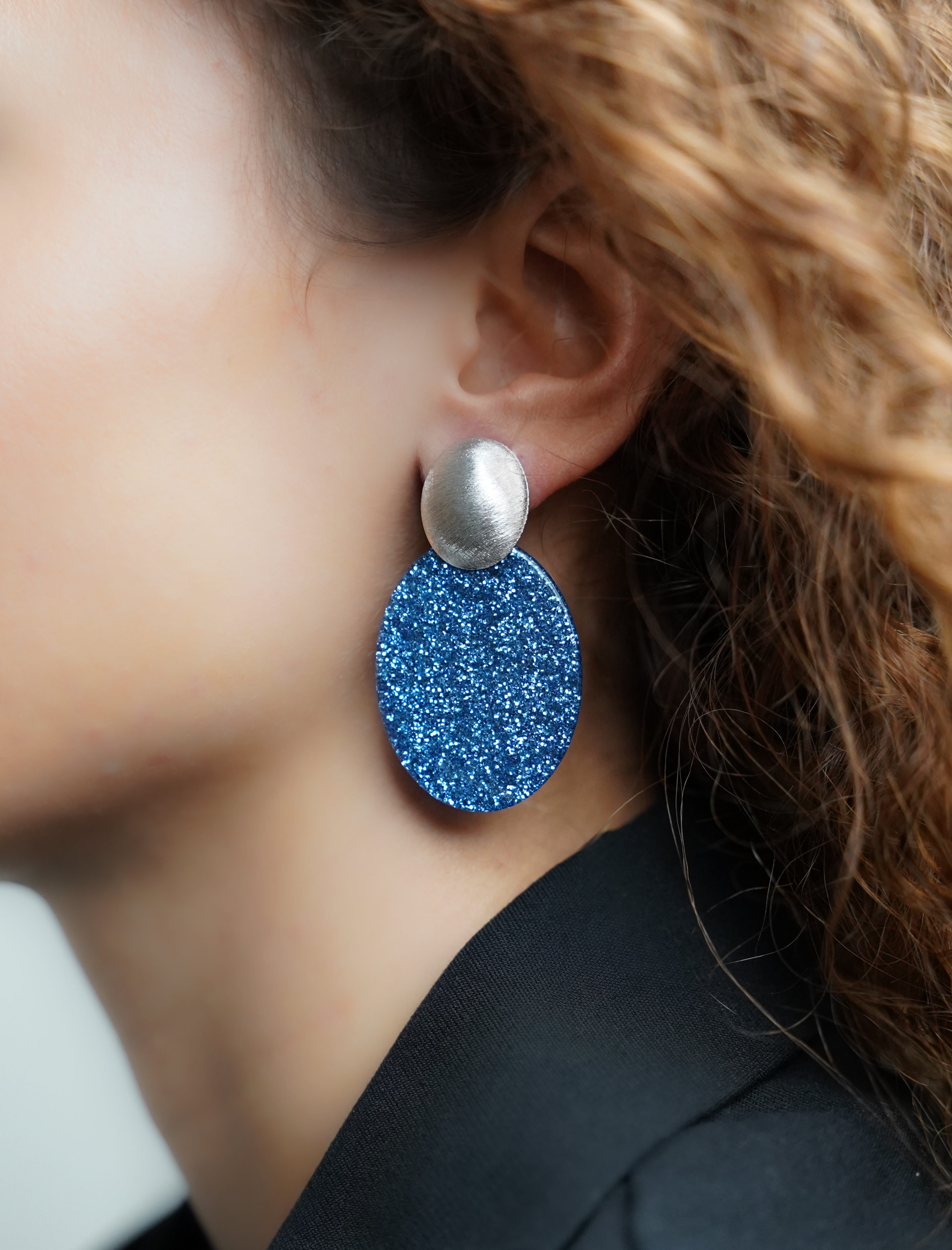 Blauwe Glitter Oorbellen Celia Ovaal Slott-theme.productDescriptionPage.SEO.byTheBrand