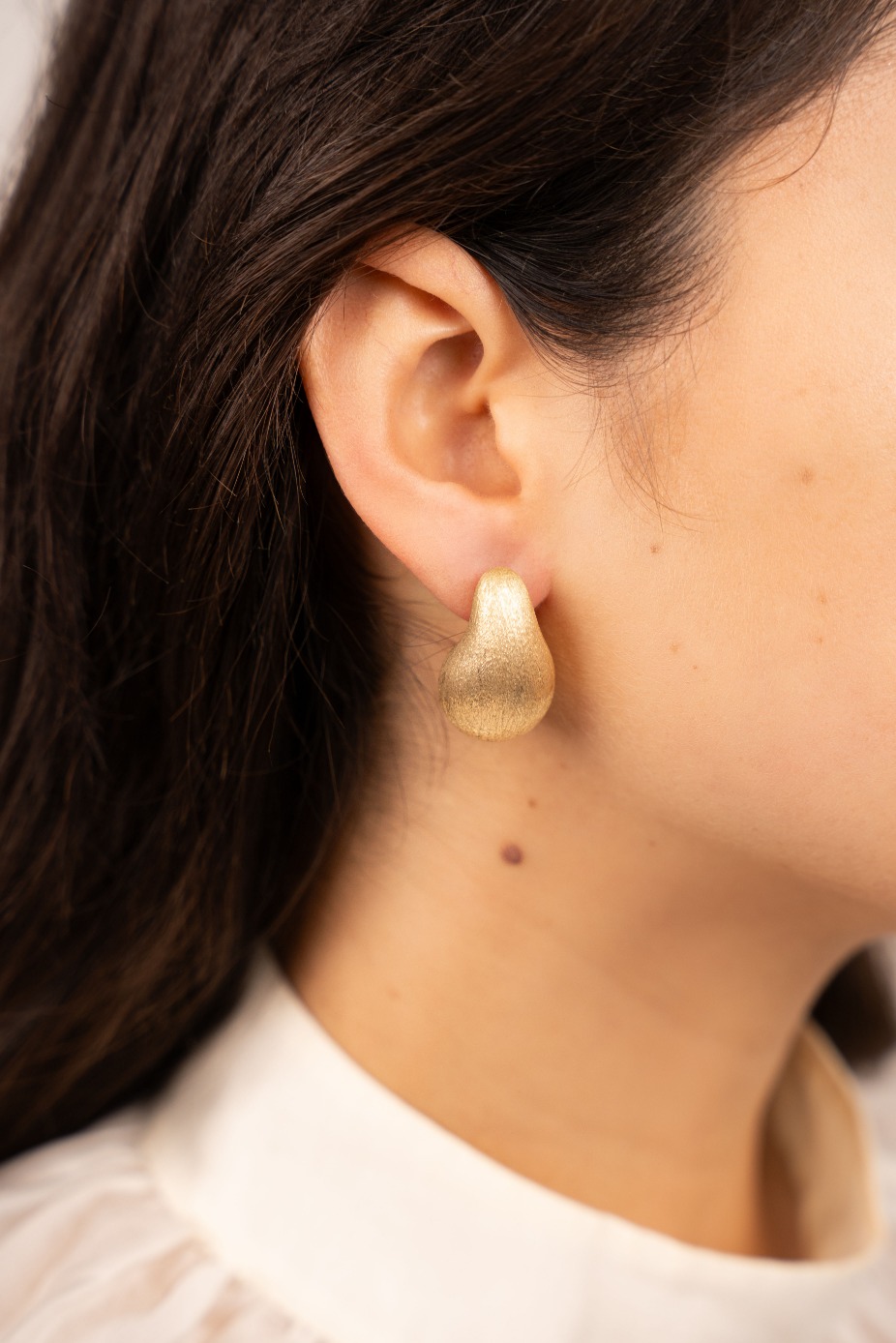 Teardrop earrings brushed gold Mlott-theme.productDescriptionPage.SEO.byTheBrand