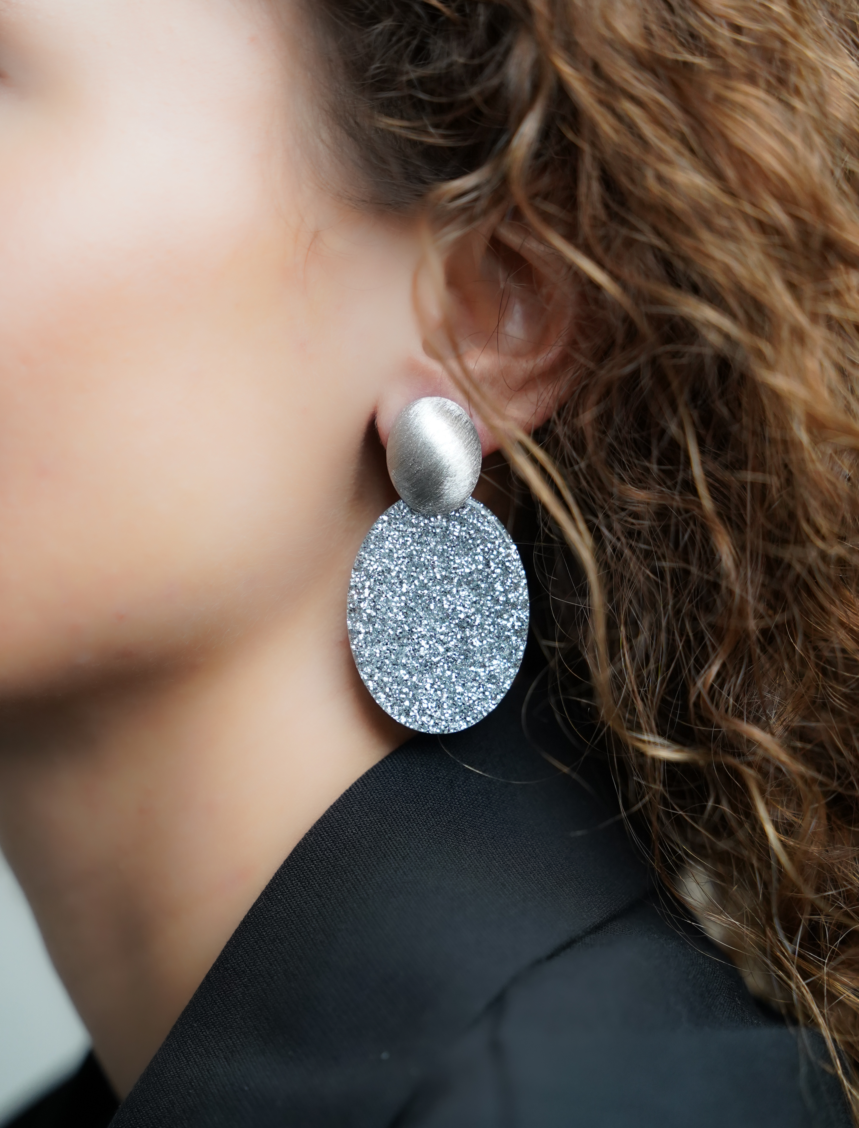 Zilveren Glitter Oorbellen Celia Ovaal Slott-theme.productDescriptionPage.SEO.byTheBrand