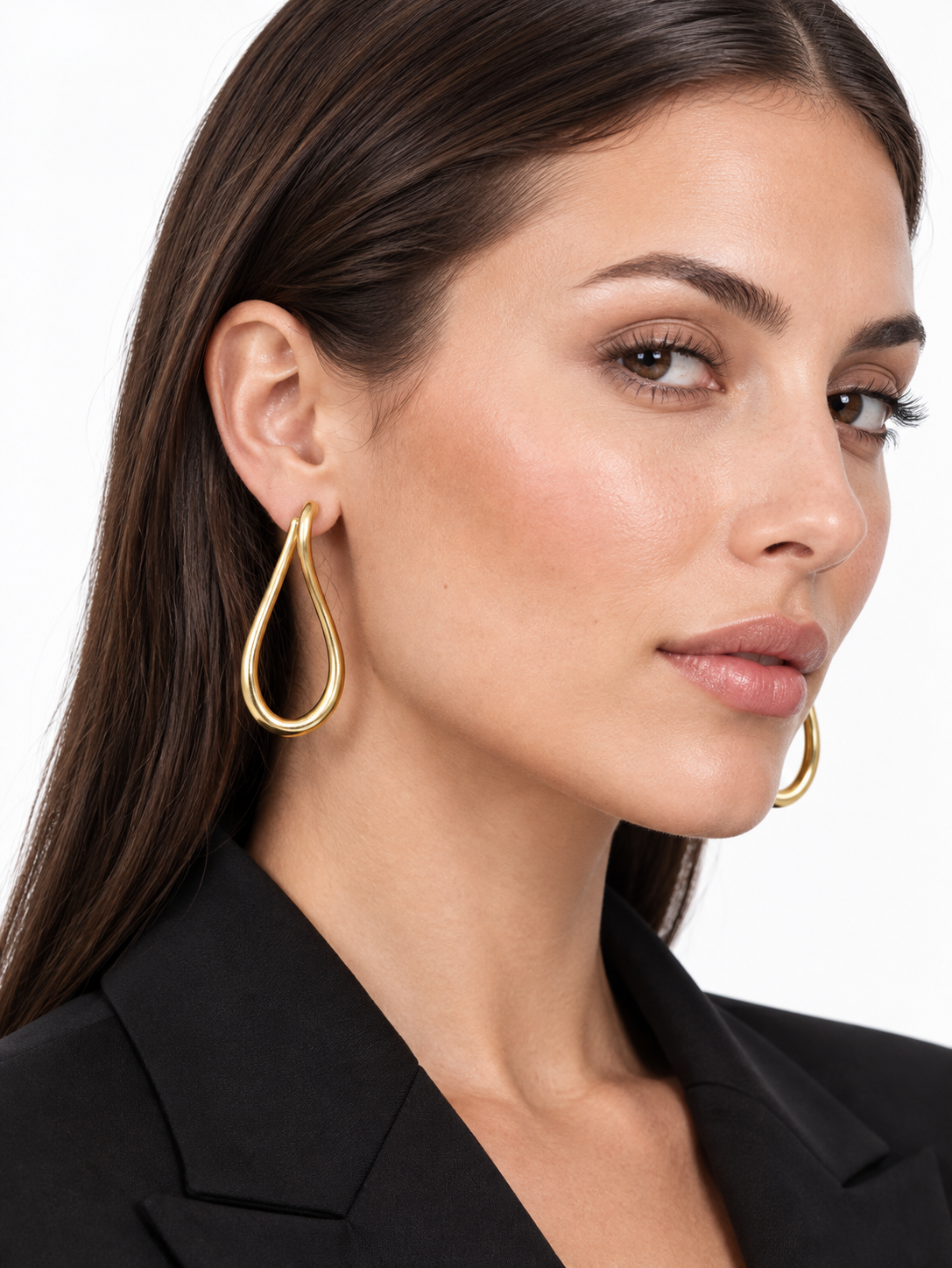 16.087 - gold colored gold twisted loop large