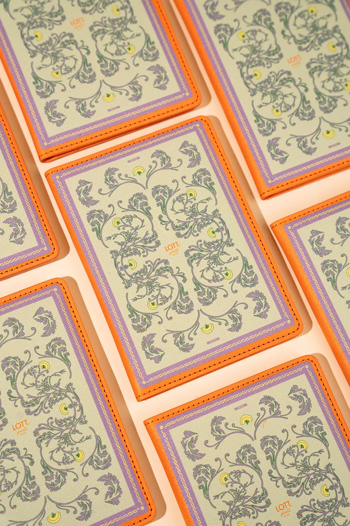 Lila/Pastel Green/Orange Passport Hoeslott-theme.productDescriptionPage.SEO.byTheBrand