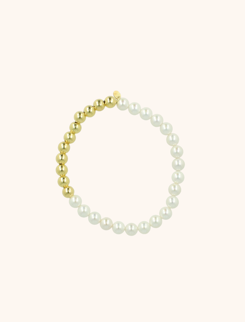 Pearl bracelet with gold cannonballs