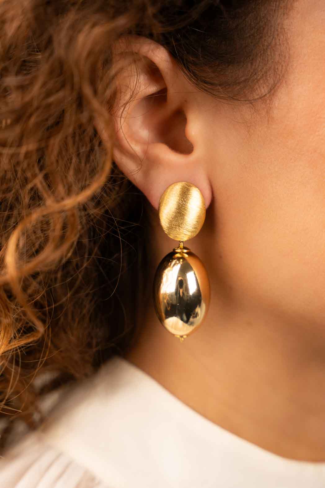 Gold-colored Earrings Egg Slott-theme.productDescriptionPage.SEO.byTheBrand