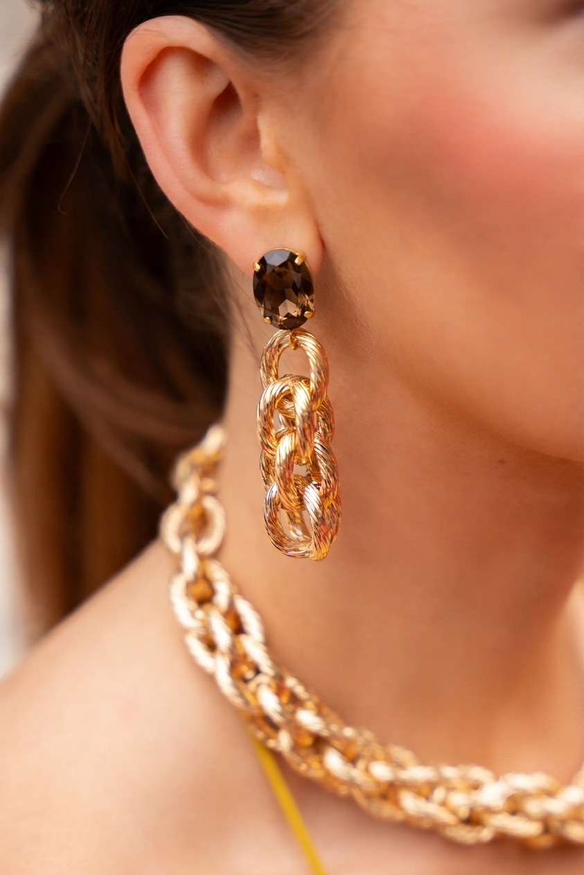 "PRE-ORDER Norell - Oorbellen Triple Rope Strass – Zacht Goud / Smoked Shadow
