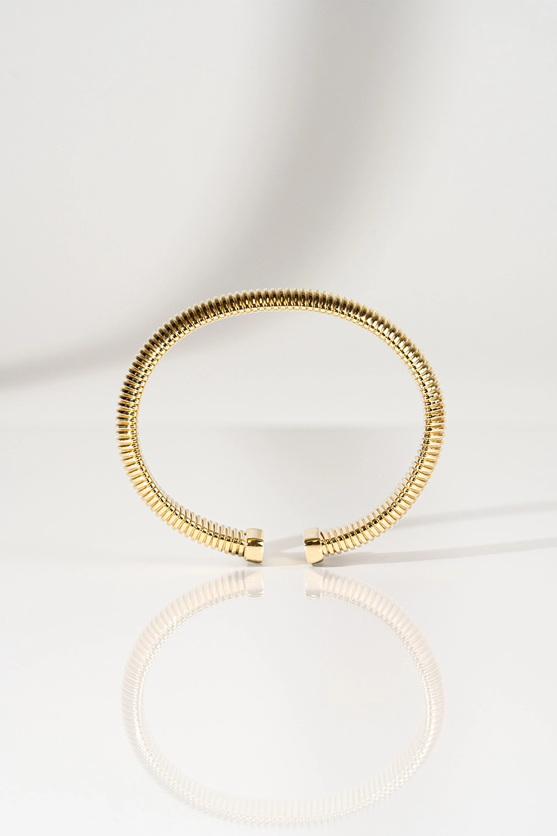 Goldfarbene Armband Bangle Striped Mile